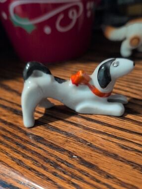 Vintage Ceramic Black & White Dog Figurine with Orange Bow